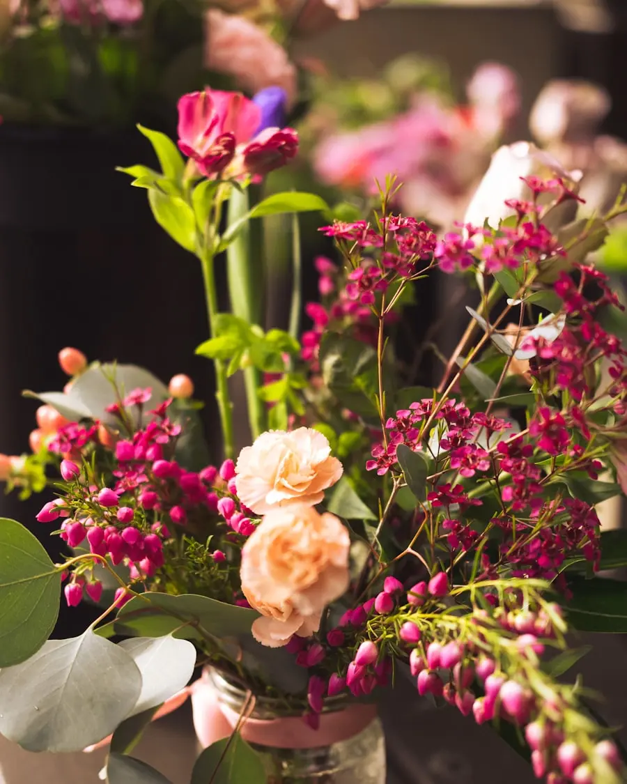 Deep magenta and pink florals against a dark background