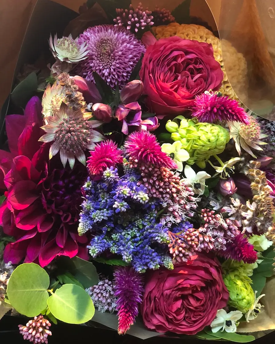 A lush arrangement of purple, magenta, and lavender flowers